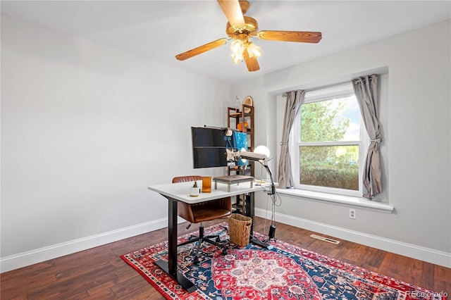 office area with ceiling fan and hardwood / wood-style floors