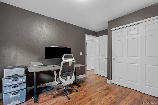 office space with hardwood / wood-style flooring