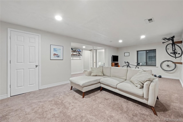 living room featuring light colored carpet