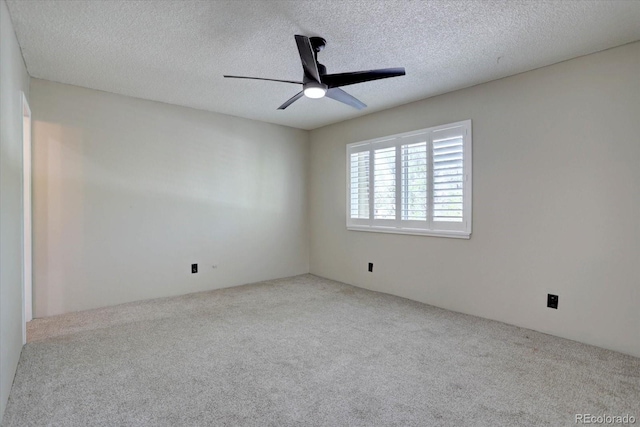 6844 S Broadway, Littleton, CO 80122 - spare room featuring carpet floors, a ceiling fan, and a textured ceiling