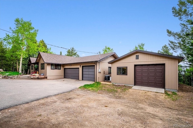 11094 Thomas Dr, Conifer, CO 80433 - ranch-style house featuring a garage