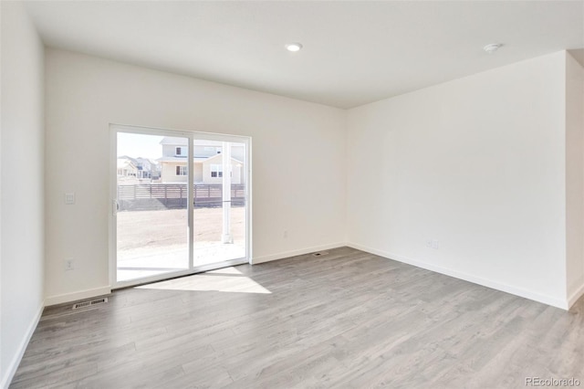 empty room featuring light hardwood / wood-style flooring