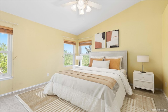 9719 Burberry Way, Highlands Ranch, CO 80129 - carpeted bedroom featuring vaulted ceiling, baseboards, and ceiling fan