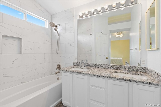9719 Burberry Way, Highlands Ranch, CO 80129 - full bath featuring tub / shower combination, ensuite bath, and double vanity