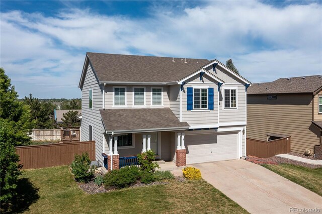 9719 Burberry Way, Highlands Ranch, CO 80129 - craftsman house featuring a porch, roof with shingles, an attached garage, and driveway