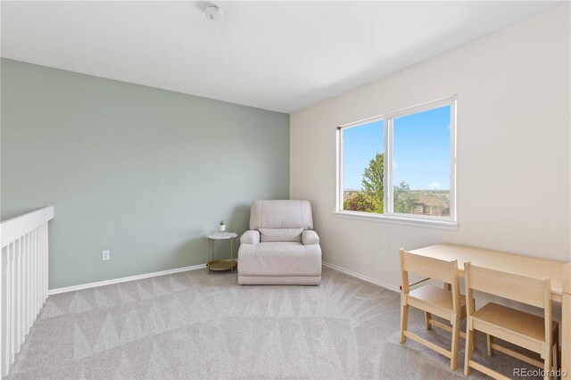 9719 Burberry Way, Highlands Ranch, CO 80129 - living area featuring baseboards and carpet flooring