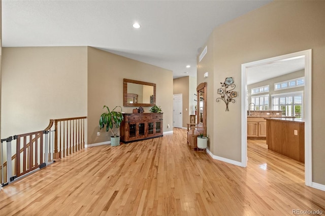 1251 Double Eagle Ct, Castle Rock, CO 80104 - corridor featuring light wood-style flooring and recessed lighting