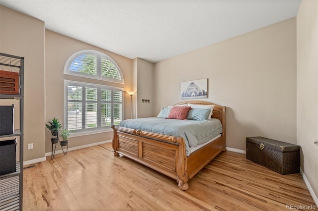 1251 Double Eagle Ct, Castle Rock, CO 80104 - bedroom featuring light wood finished floors and baseboards