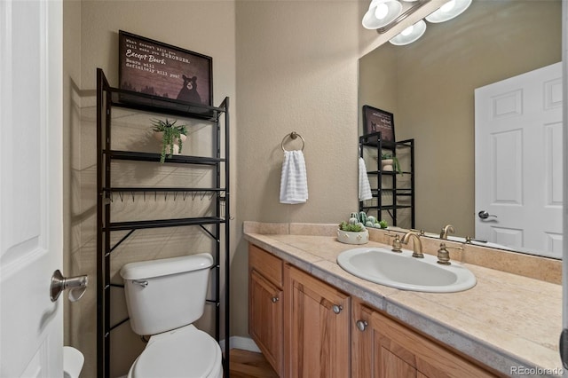 1251 Double Eagle Ct, Castle Rock, CO 80104 - bathroom featuring vanity and toilet