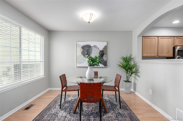 dining room featuring hardwood / wood-style flooring