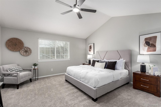 carpeted bedroom with vaulted ceiling and ceiling fan