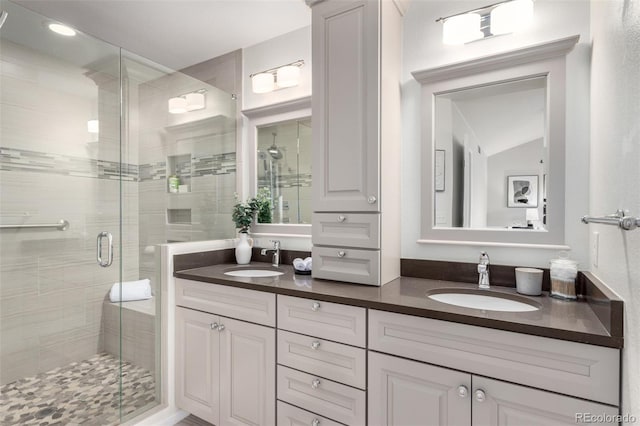 bathroom featuring vanity and walk in shower