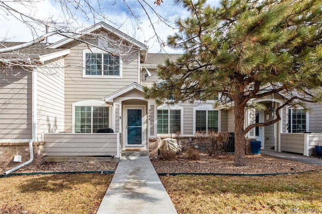 view of front of property with a front lawn