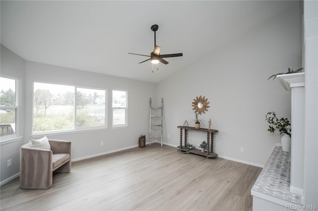 329 Lodgewood Ln, Lafayette, CO 80026 - living area with a ceiling fan, plenty of natural light, light wood-style flooring, lofted ceiling, and baseboards