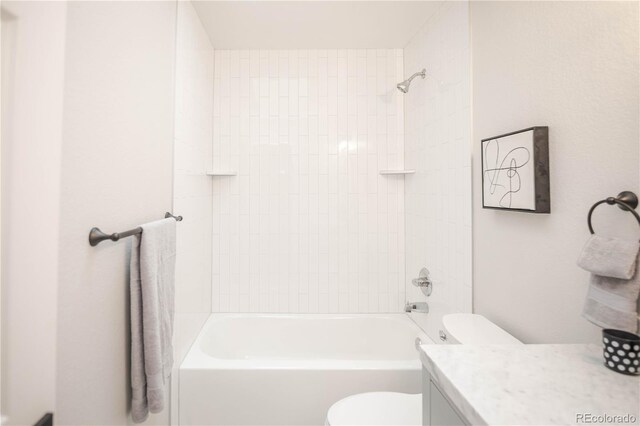 329 Lodgewood Ln, Lafayette, CO 80026 - bathroom featuring toilet, bathtub / shower combination, and vanity