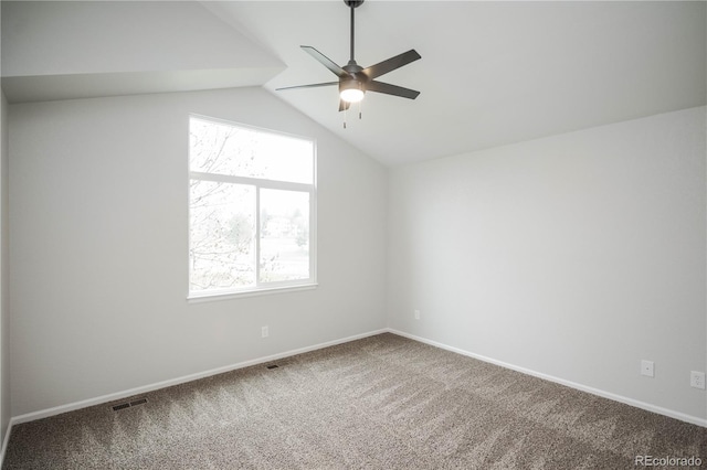 329 Lodgewood Ln, Lafayette, CO 80026 - carpeted empty room featuring ceiling fan, healthy amount of natural light, lofted ceiling, and baseboards
