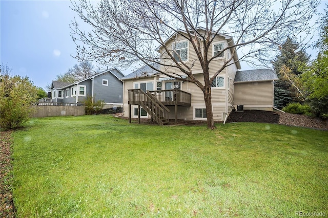 329 Lodgewood Ln, Lafayette, CO 80026 - rear view of house with stairs, a wooden deck, and central air condition unit