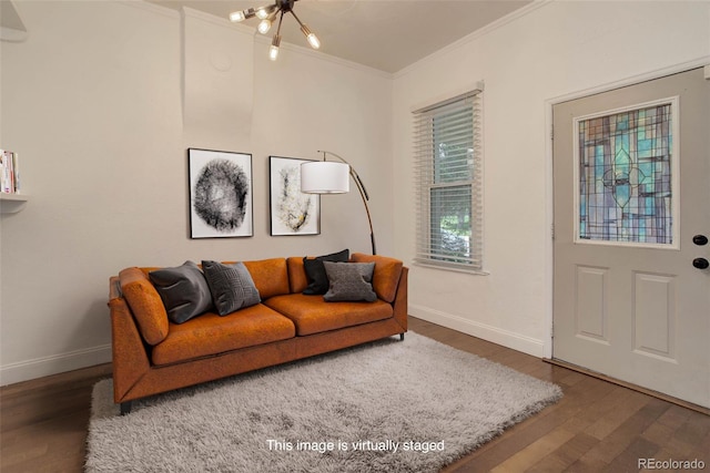 4032 Lipan St, Denver, CO 80211 - living area with crown molding, wood finished floors, and a chandelier