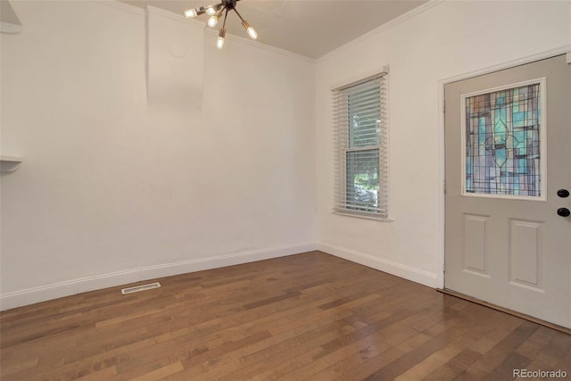 4032 Lipan St, Denver, CO 80211 - entryway with a chandelier, wood-type flooring, and crown molding