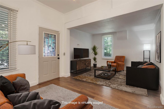4032 Lipan St, Denver, CO 80211 - living room with crown molding and wood finished floors