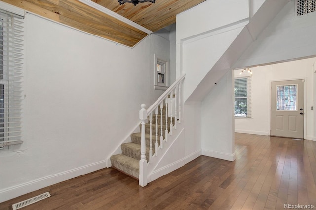 4032 Lipan St, Denver, CO 80211 - stairs featuring wooden ceiling and wood-type flooring