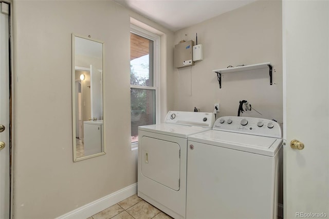 4032 Lipan St, Denver, CO 80211 - laundry room featuring washer and dryer and light tile patterned floors