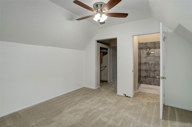 4032 Lipan St, Denver, CO 80211 - unfurnished bedroom with a spacious closet, lofted ceiling, light carpet, a closet, and ceiling fan