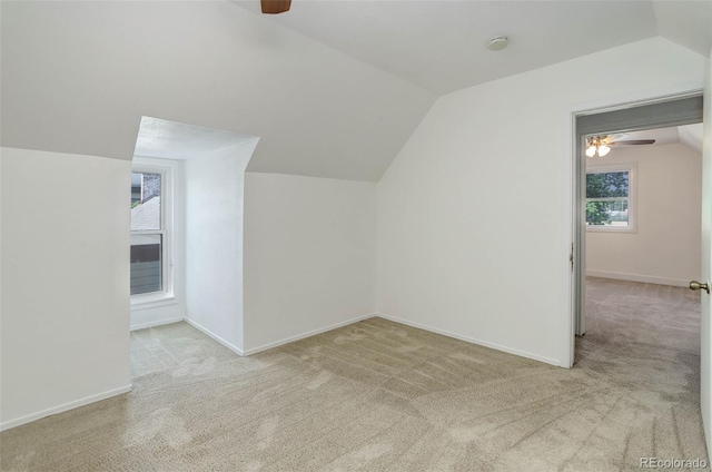 4032 Lipan St, Denver, CO 80211 - bonus room featuring a ceiling fan, vaulted ceiling, and carpet floors