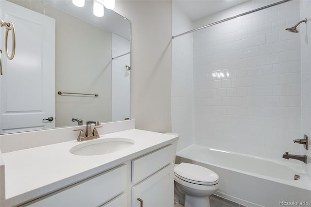 3443 N Gold Bug Ct, Aurora, CO 80019 - full bath featuring toilet, shower / tub combination, and vanity