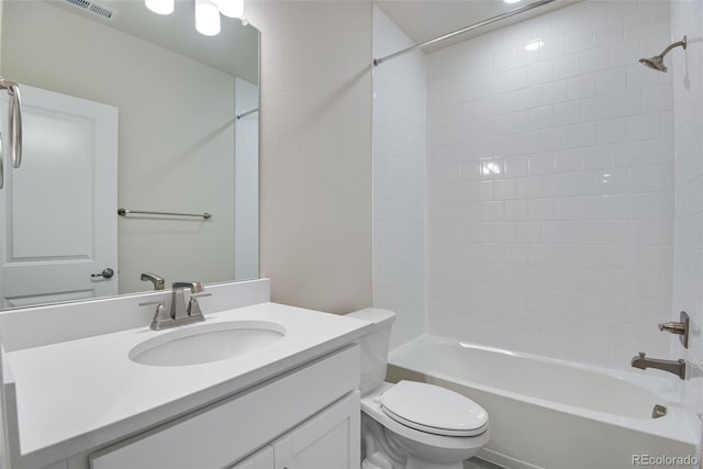 3443 N Gold Bug Ct, Aurora, CO 80019 - bathroom featuring bathtub / shower combination, visible vents, toilet, and vanity