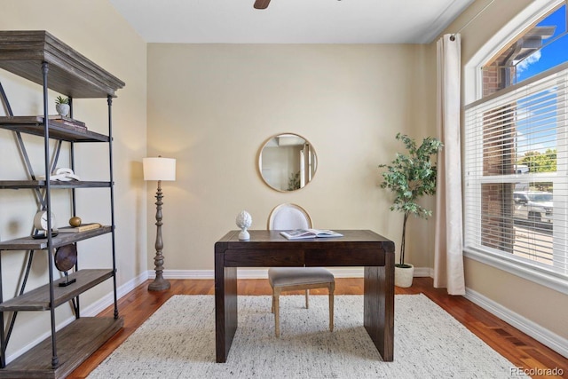 7472 Iridium Way, Castle Rock, CO 80108 - office area with wood finished floors and ceiling fan