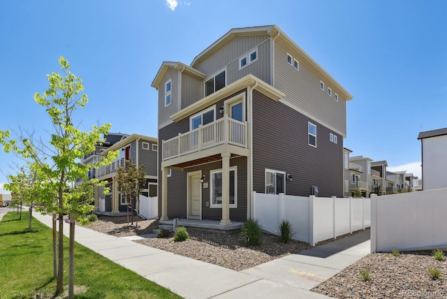 5121 N Yampa St, Denver, CO 80249 - view of side of property with a balcony and a porch