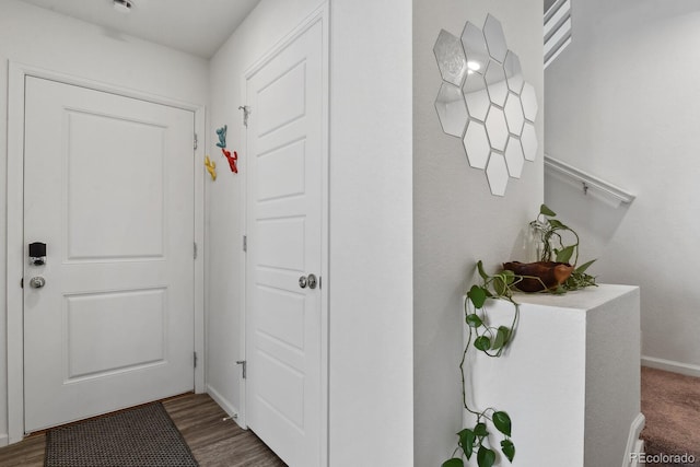 5121 N Yampa St, Denver, CO 80249 - doorway to outside featuring baseboards