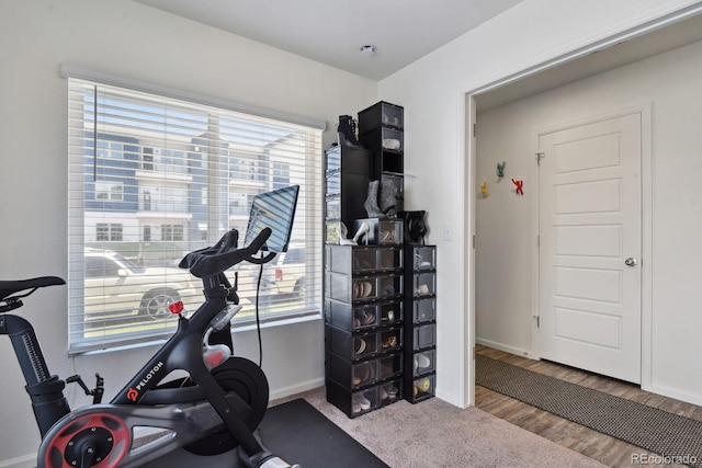 5121 N Yampa St, Denver, CO 80249 - workout area with baseboards and wood finished floors