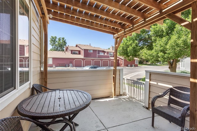 8452 Everett Way Unit C, Arvada, CO 80005 - view of patio / terrace featuring a pergola and a residential view