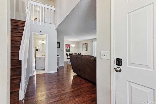 8452 Everett Way Unit C, Arvada, CO 80005 - foyer entrance featuring dark wood-style flooring and stairs