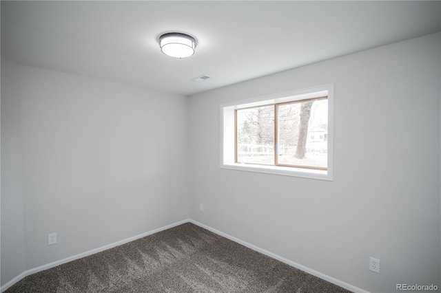 329 Lodgewood Ln, Lafayette, CO 80026 - empty room with baseboards and dark colored carpet