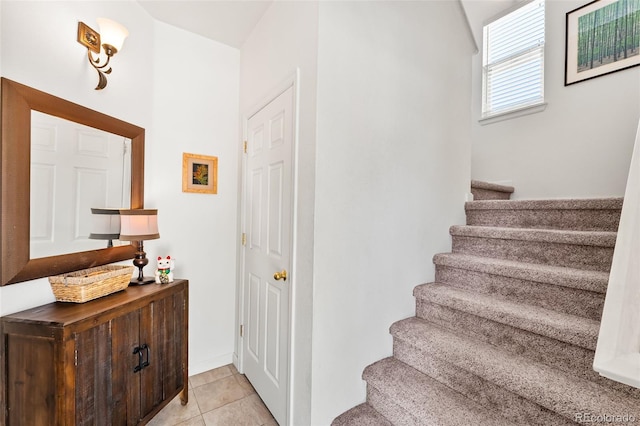 4501 Nelson Rd Unit 2201, Longmont, CO 80503 - stairs with tile patterned flooring