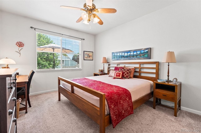 4501 Nelson Rd Unit 2201, Longmont, CO 80503 - carpeted bedroom with baseboards and ceiling fan