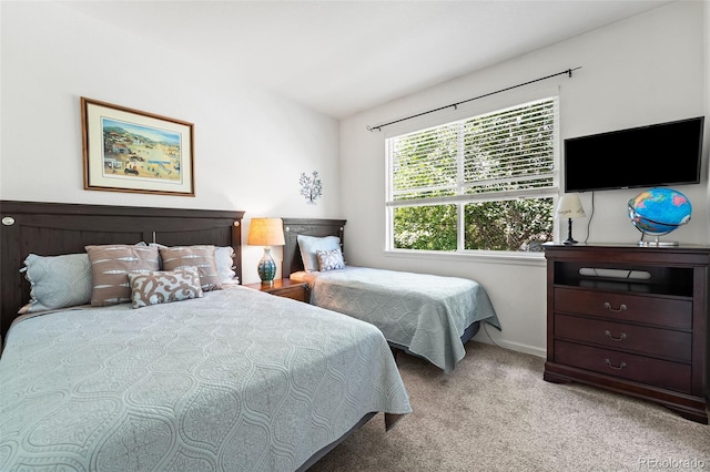 4501 Nelson Rd Unit 2201, Longmont, CO 80503 - carpeted bedroom with baseboards and lofted ceiling