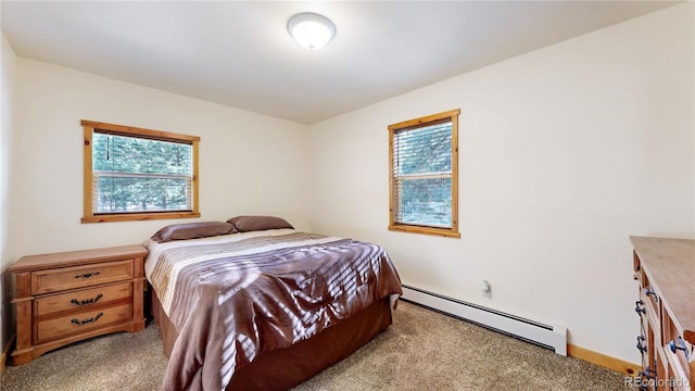 7 Rock Canyon Rd, Drake, CO 80515 - bedroom with baseboards, a baseboard radiator, and light colored carpet