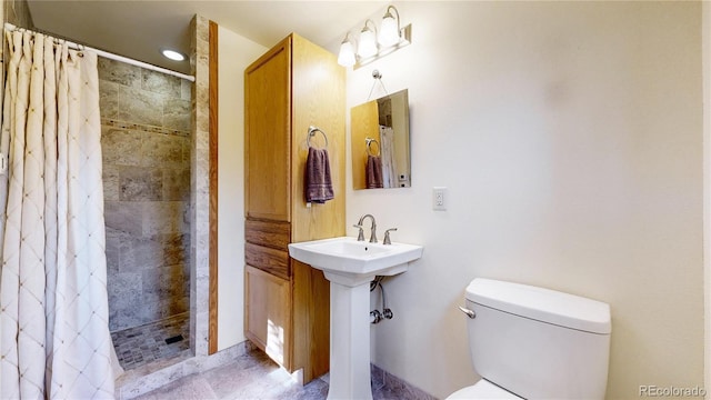 7 Rock Canyon Rd, Drake, CO 80515 - bathroom featuring toilet and a tile shower