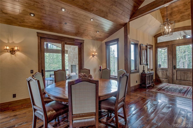 dining area with a wealth of natural light, wood ceiling, hardwood / wood-style floors, and vaulted ceiling