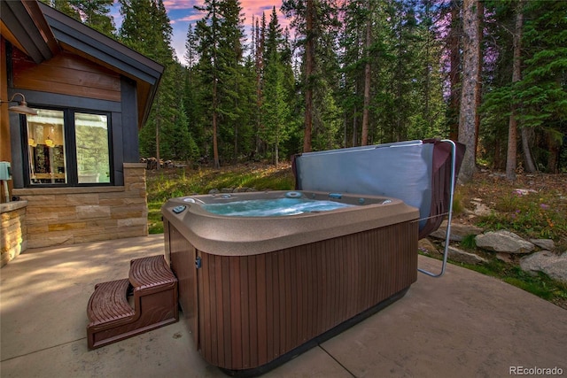 view of patio with a hot tub