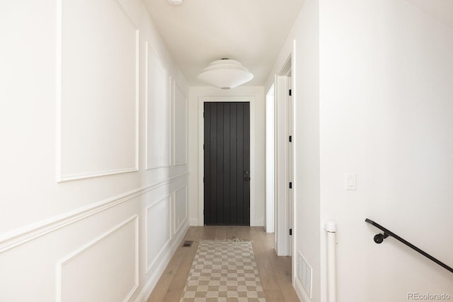 3530 Fenton St, Wheat Ridge, CO 80212 - entryway featuring light wood-style floors