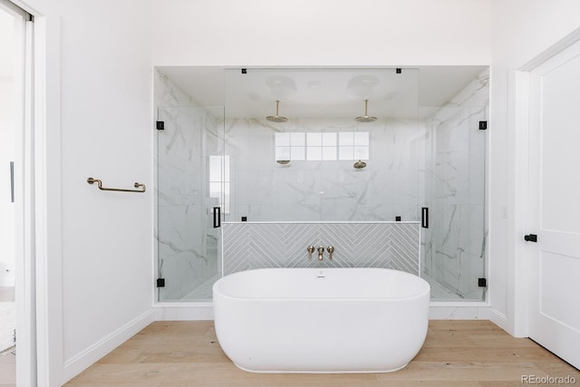 3530 Fenton St, Wheat Ridge, CO 80212 - bathroom with wood finished floors, a marble finish shower, and a soaking tub
