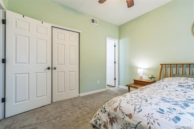 1771 W 53rd Pl Unit 2, Denver, CO 80221 - bedroom with carpet flooring, a closet, baseboards, and a ceiling fan