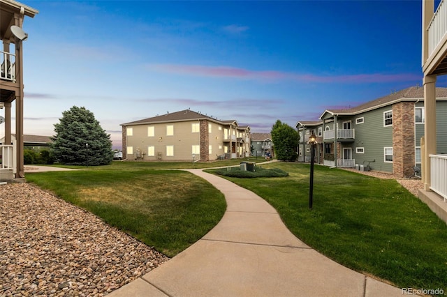 1771 W 53rd Pl Unit 2, Denver, CO 80221 - surrounding community featuring a residential view and a yard