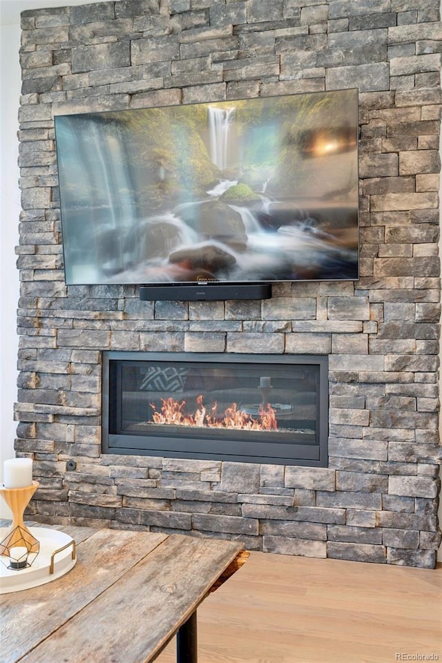 3478 Chase St, Wheat Ridge, CO 80212 - detailed view of a stone fireplace and wood finished floors