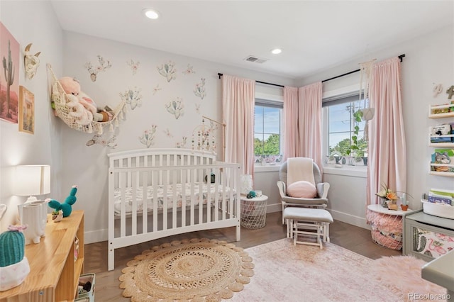 3478 Chase St, Wheat Ridge, CO 80212 - bedroom with a crib, wood finished floors, and recessed lighting